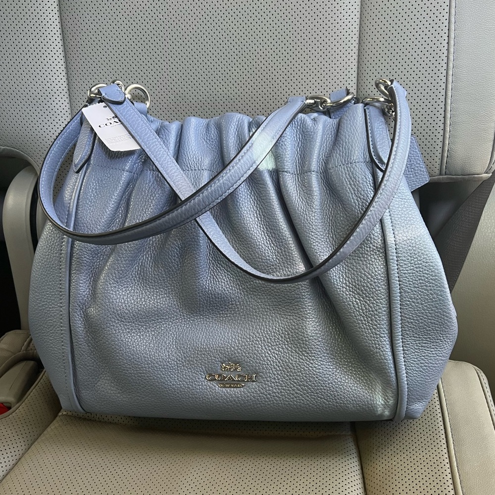 Light blue coach purse.